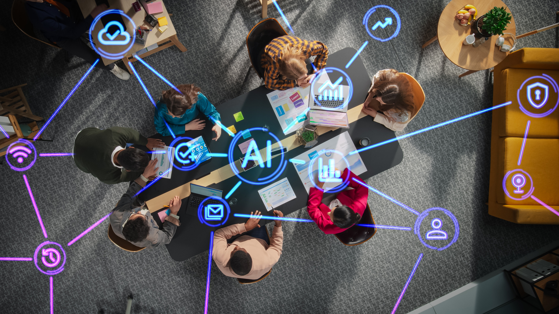 Business team collaborating around an AI-enabled workflow