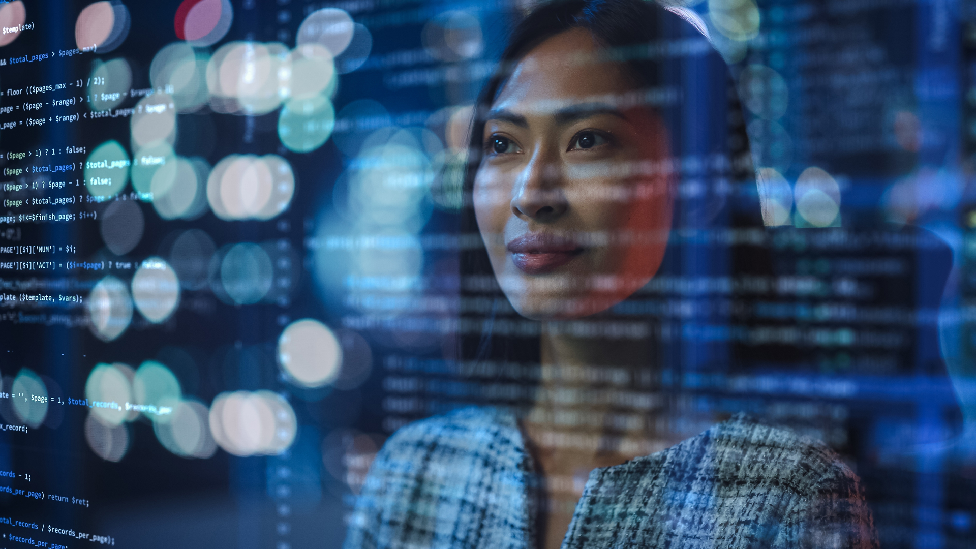 Professional working with layered digital code and data